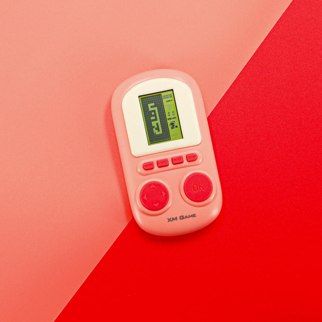 Rožinė mini nešiojama elektroninė vikrumo žaidimų konsolė