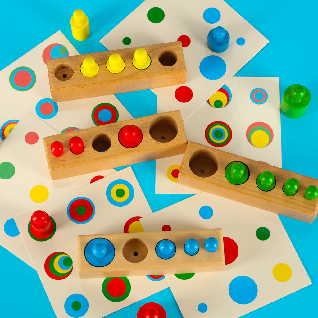 Spalvinga medinė Montessori dėlionė: cilindrai-svoriai
