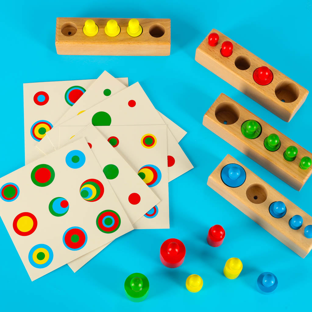 Spalvinga medinė Montessori dėlionė: cilindrai-svoriai