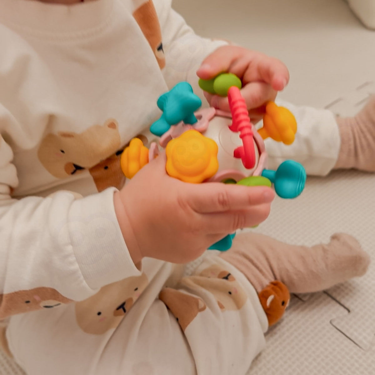 WOOPIE BABY minkštas barškutis-kramtukas 4in1 kūdikiams 0m+