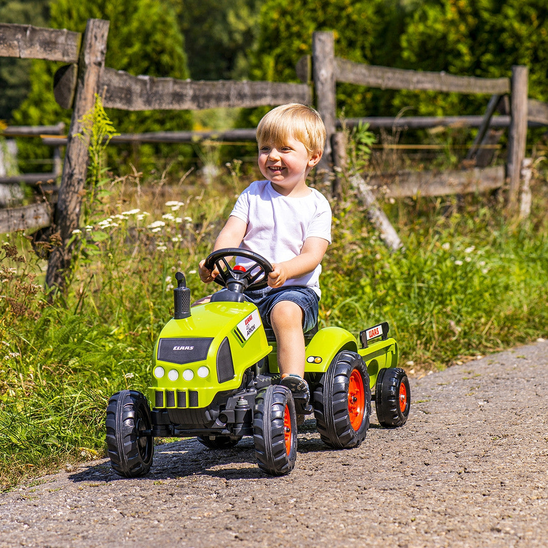 FALK Claas Arion 410 minimas traktorius su priekaba 2–5 m.