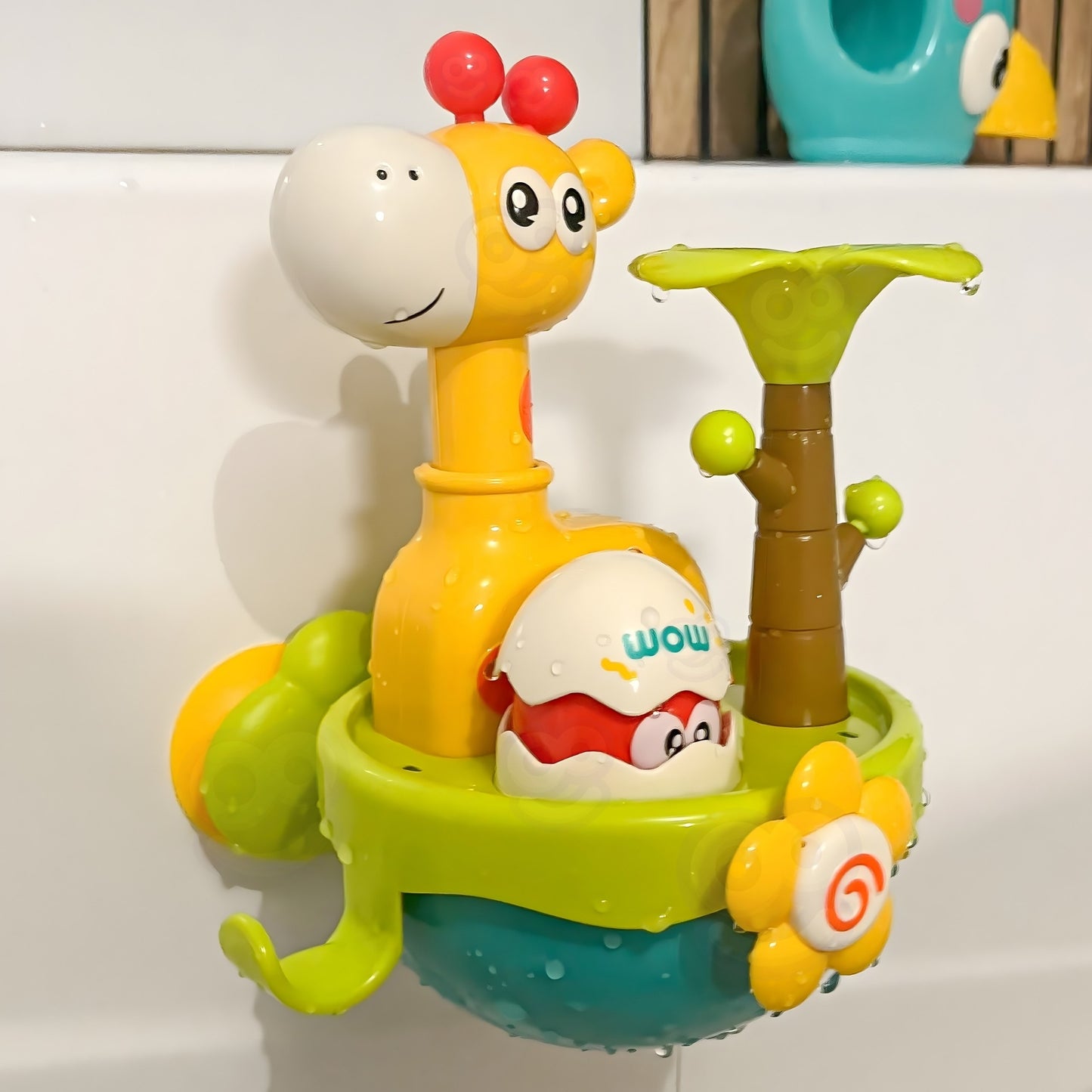 WOOPIE BABY Žirafos vonios žaislas su siurbtuku ir piltuvėliu