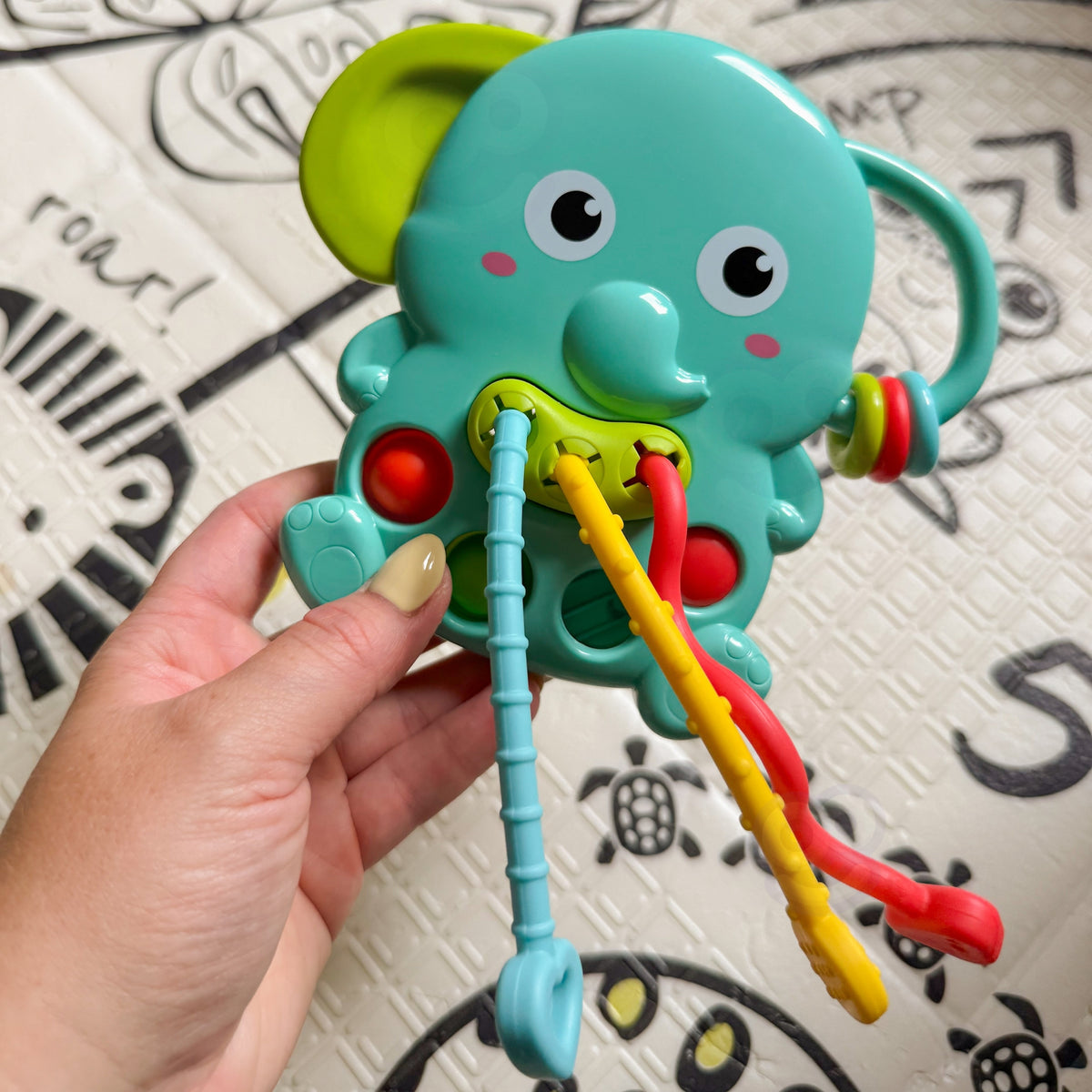 Montessori drambliukas 4-in-1 kramtukas kūdikiams Woopie
