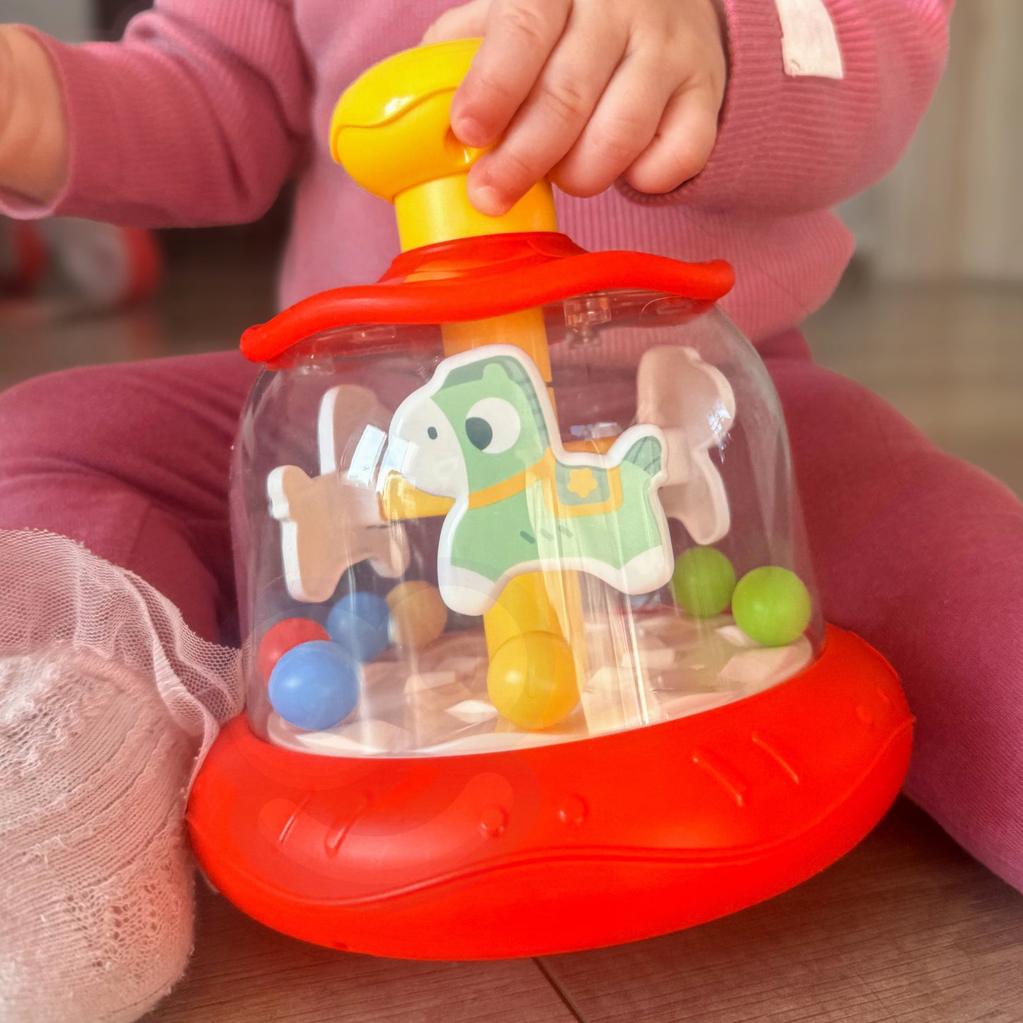 WOOPIE BABY Spalvingos Arkliukų Karuselė Suktukas Kūdikiams nuo 6 mėn.