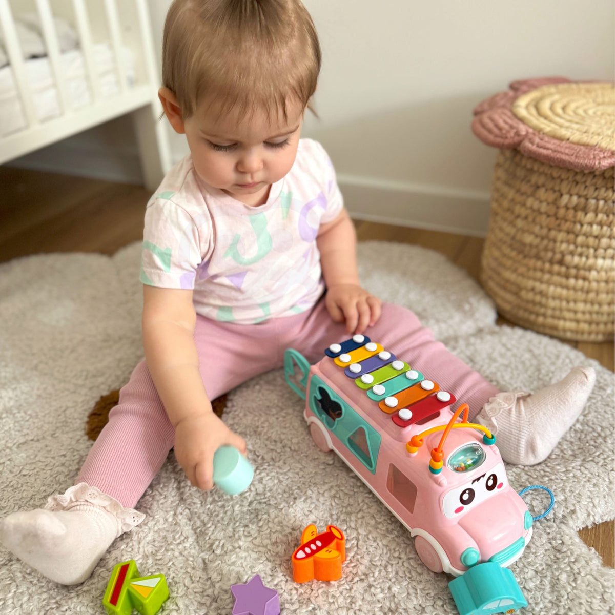 WOOPIE BABY Muzikinė mašinėlė rūšiuoklė su cimbolais, rožinė