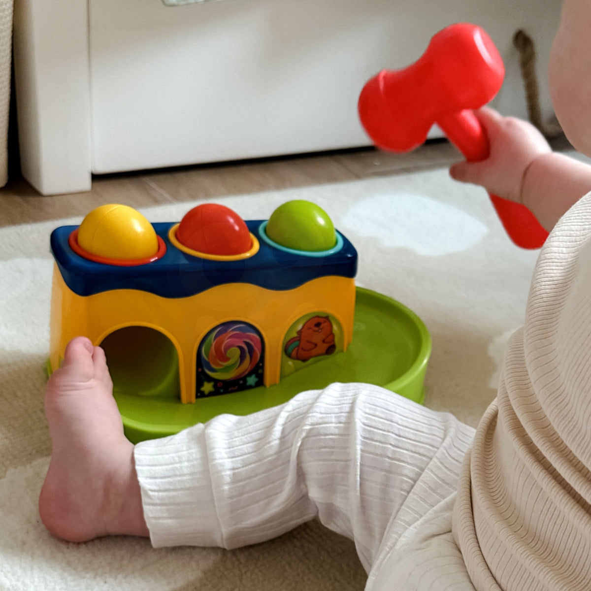 WOOPIE BABY spalvingas Montessori kalimo takelis su plaktuku