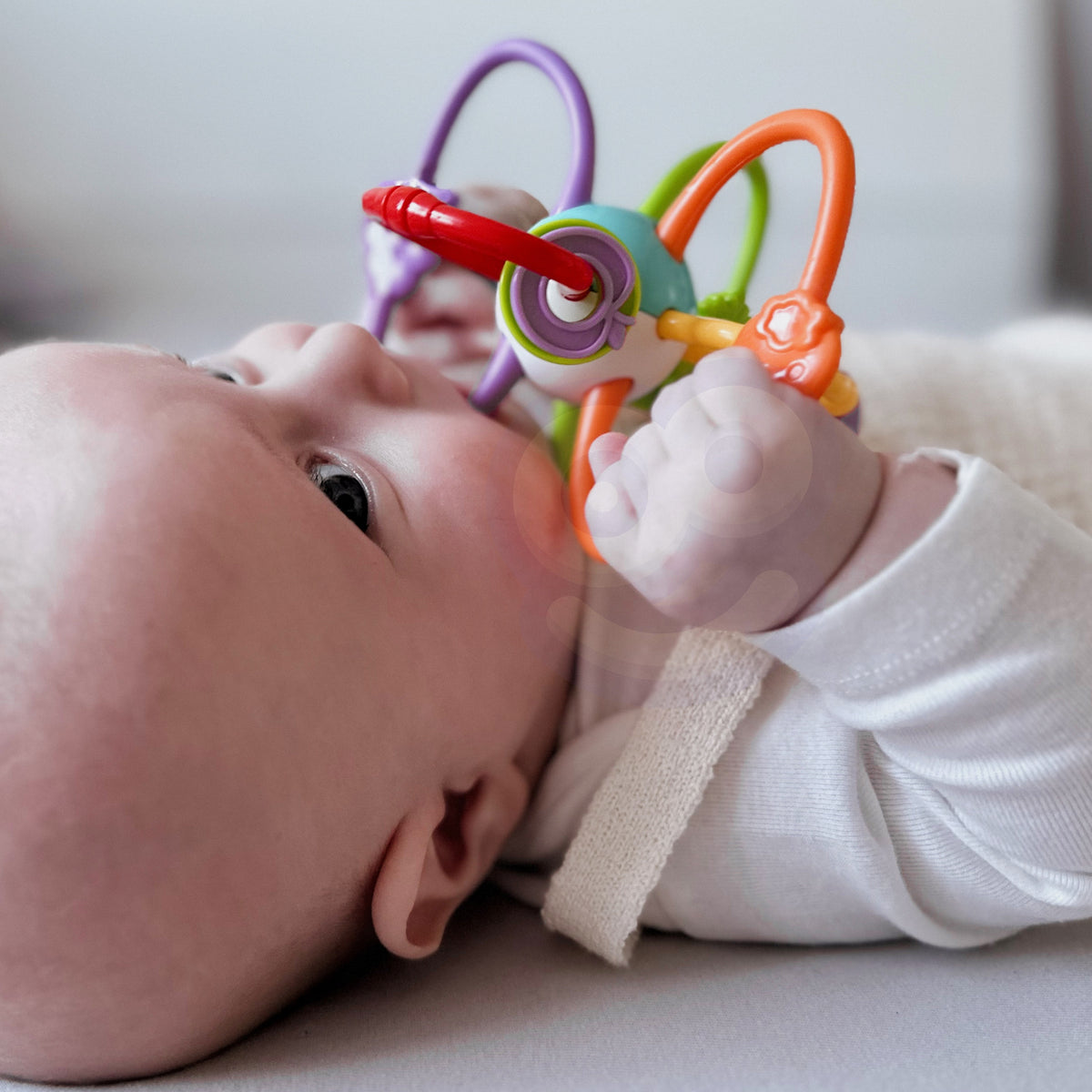 Woopie Baby sensorinis žaislas barškutis-kramtukas 2in1