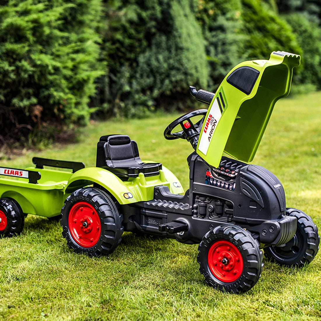 FALK Claas Arion 410 minimas traktorius su priekaba 2–5 m.